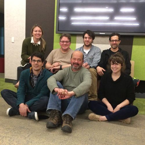2015-02-25 Homebrew Website Club participants, seven of them, sit in two rows for a photograph